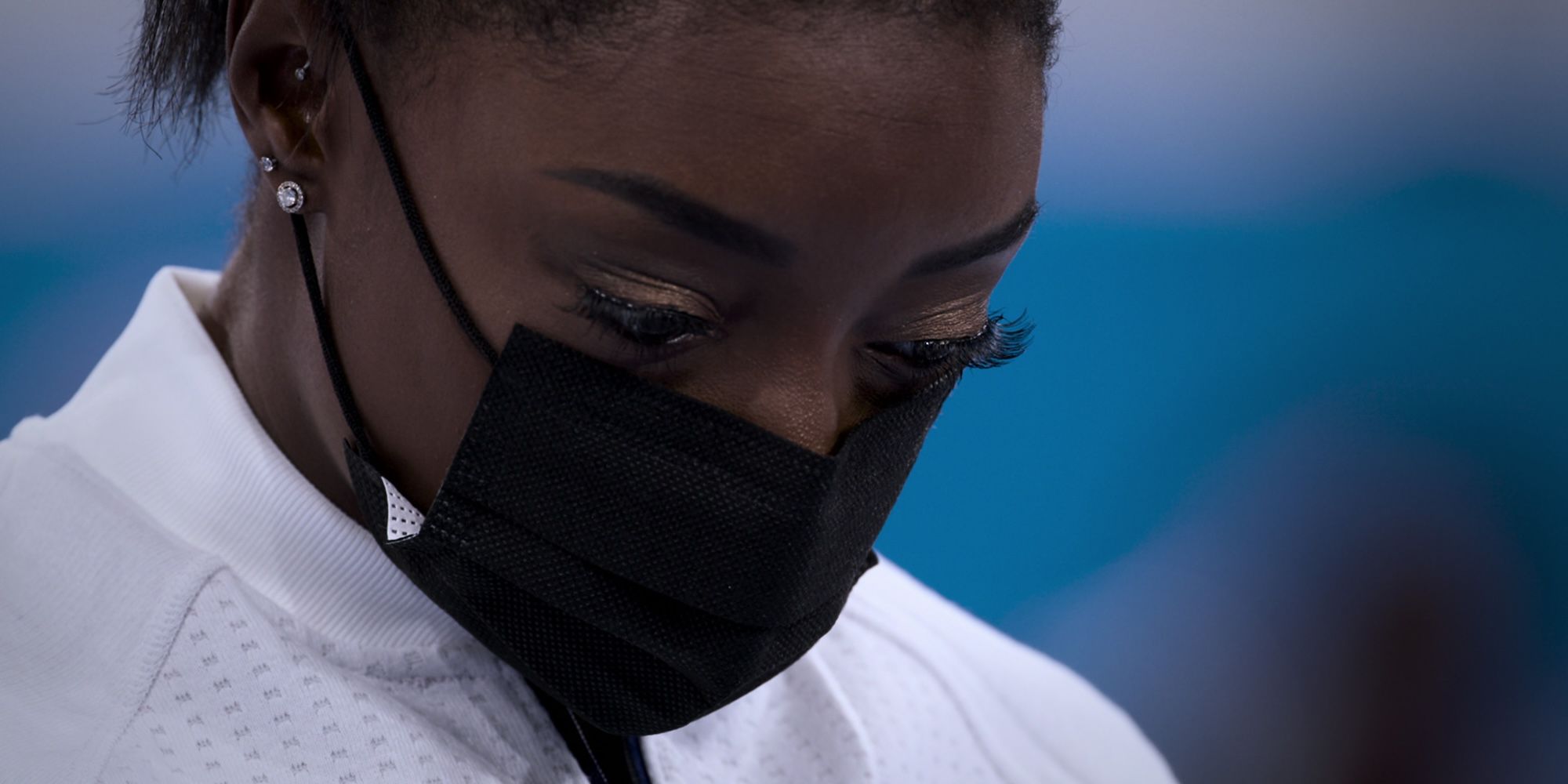 Simone Biles looking stressed wearing a mask in 2024 Netflix docuseries Simone Biles Rising.