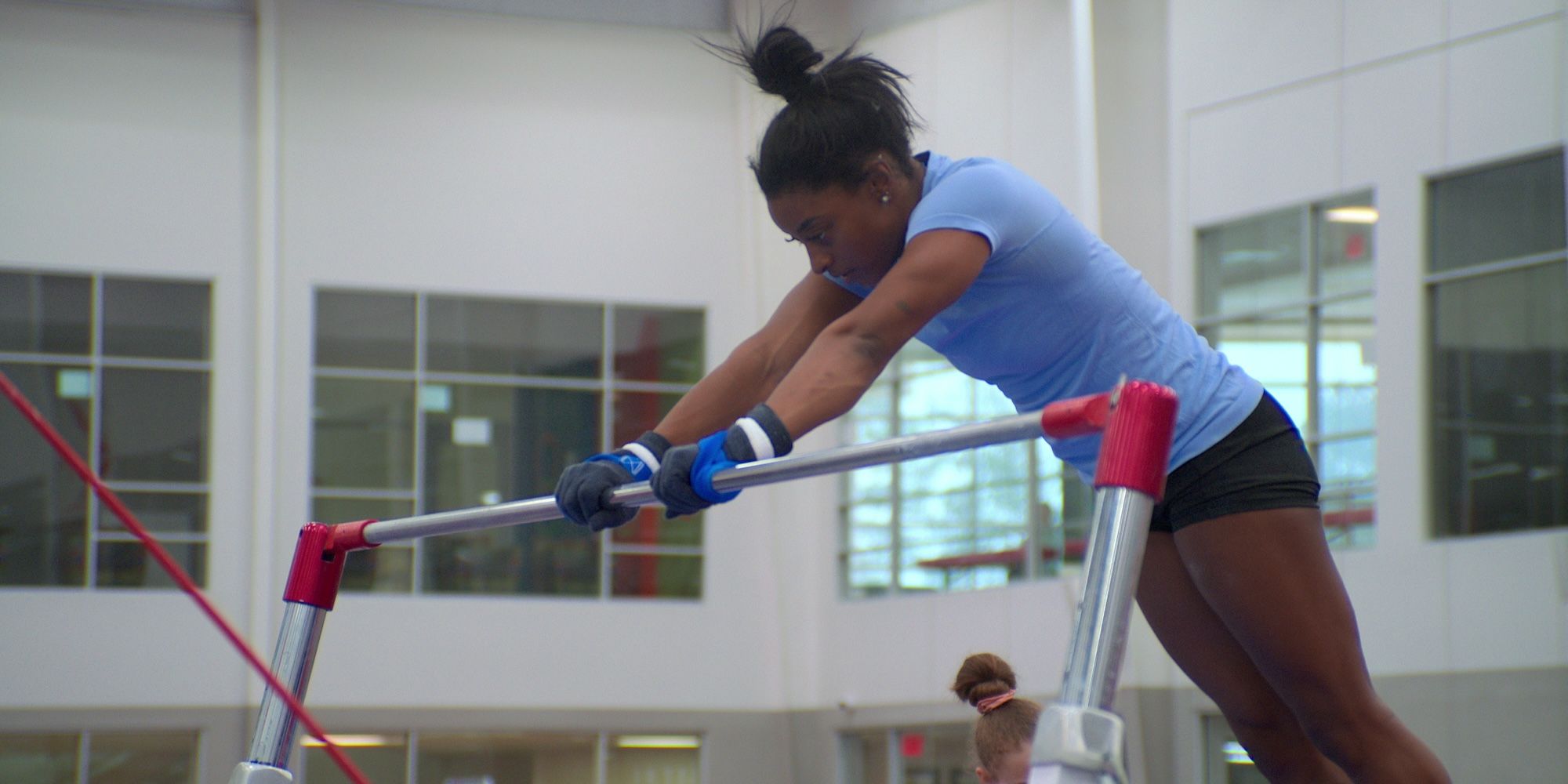 Simone Biles on bar in Simone Biles Rising