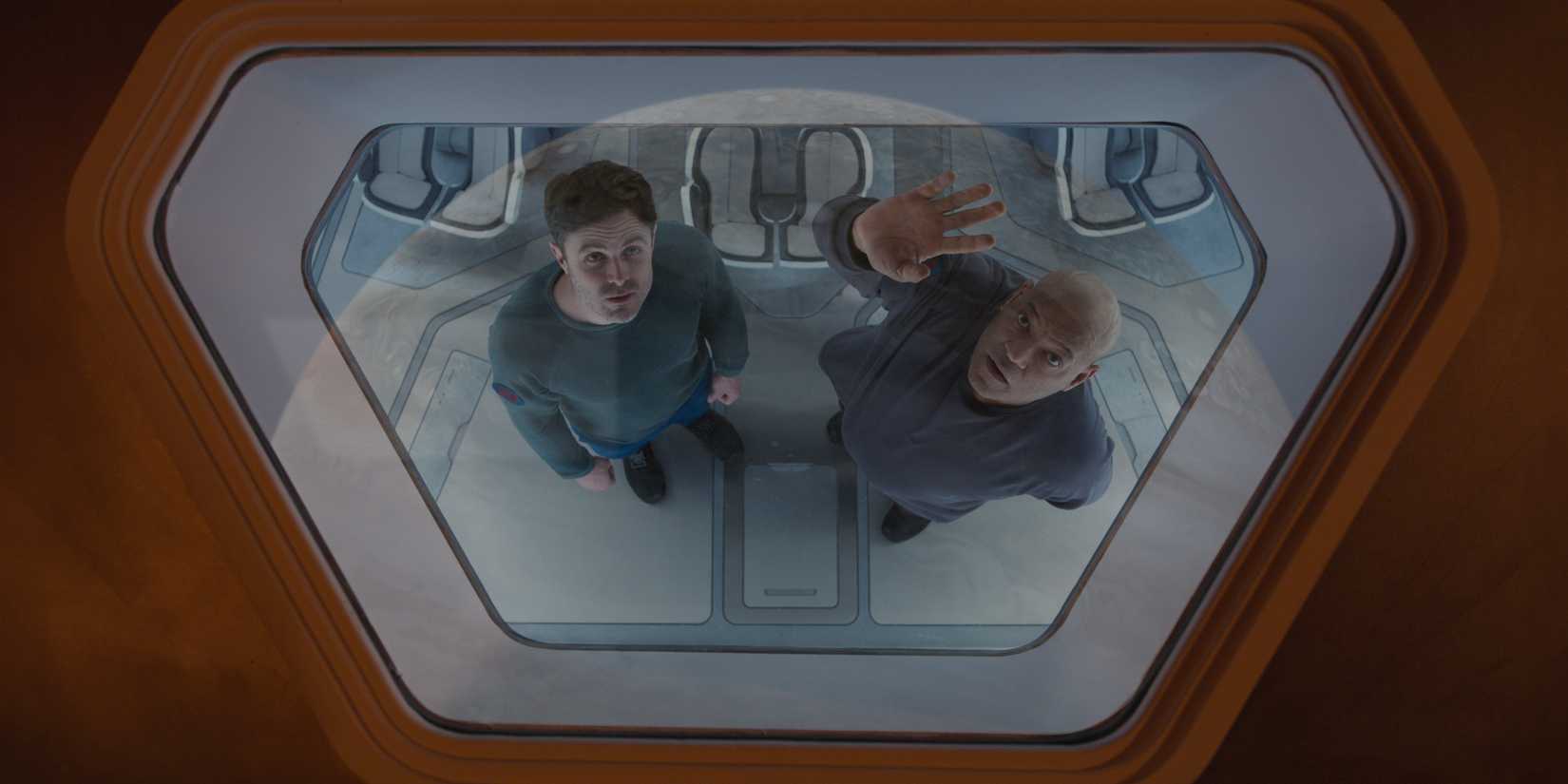 Captain Franks (Laurence Fishburne) and John (Casey Affleck) looking up at the moon in Slingshot.