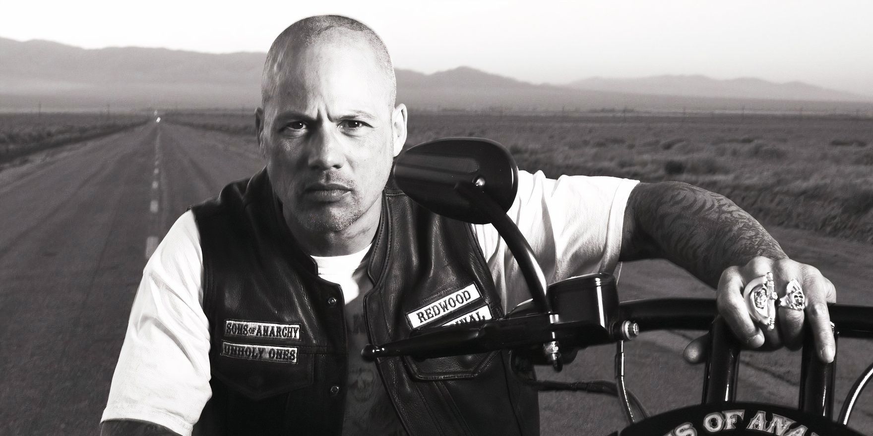 Hijos de la anarquía David Labrava como Happy Loman