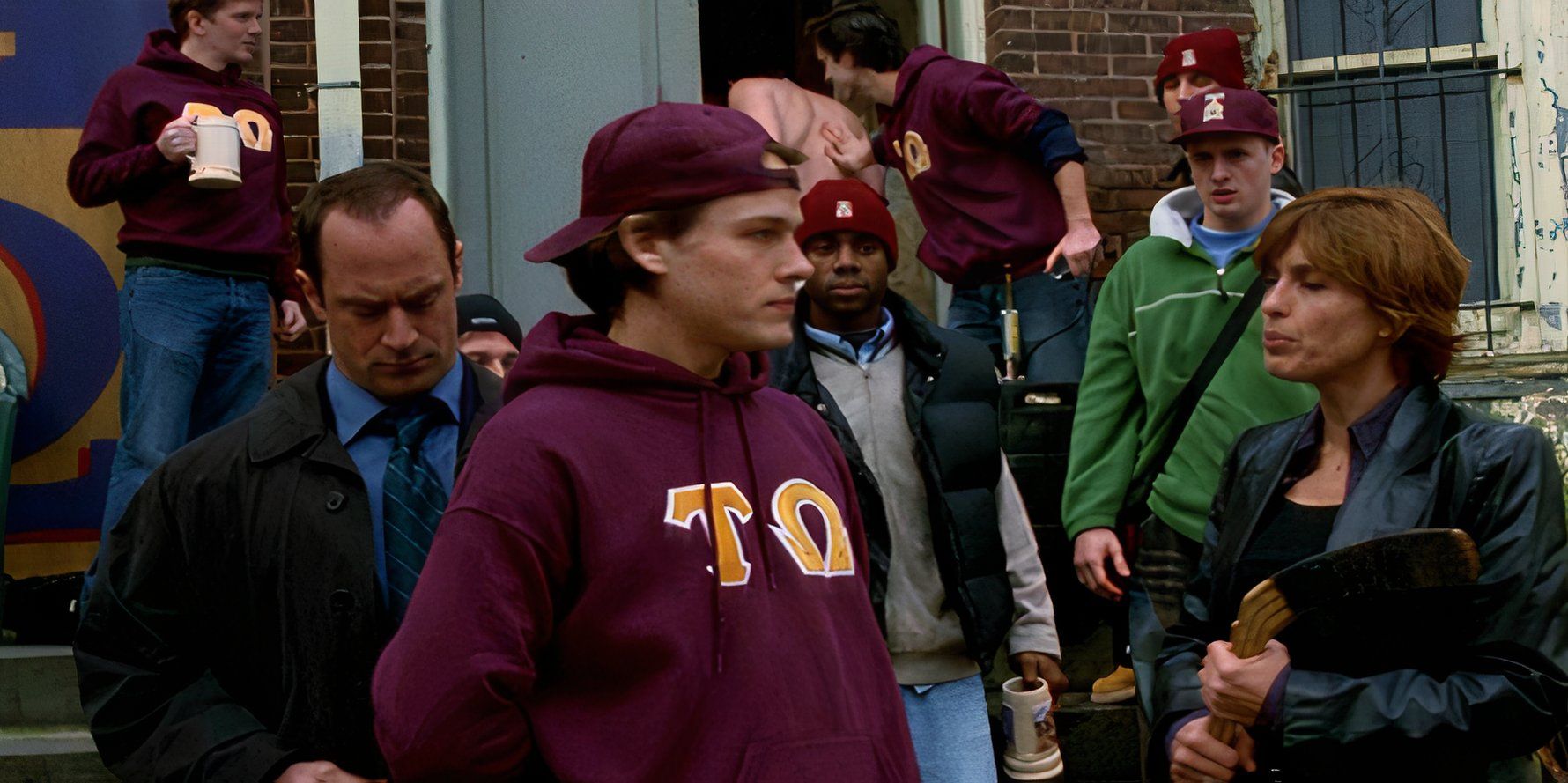 Stabler and Benson arrest a fraternity member while his brothers look on in the Law and Order SVU episode Brotherhood