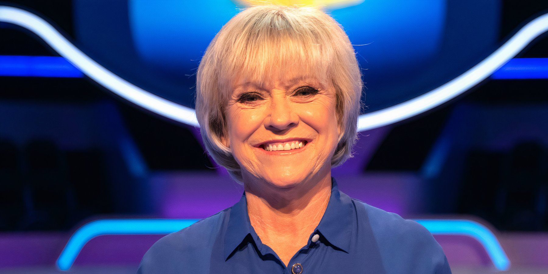 Sue Barker smiling on the set of Question of Sport