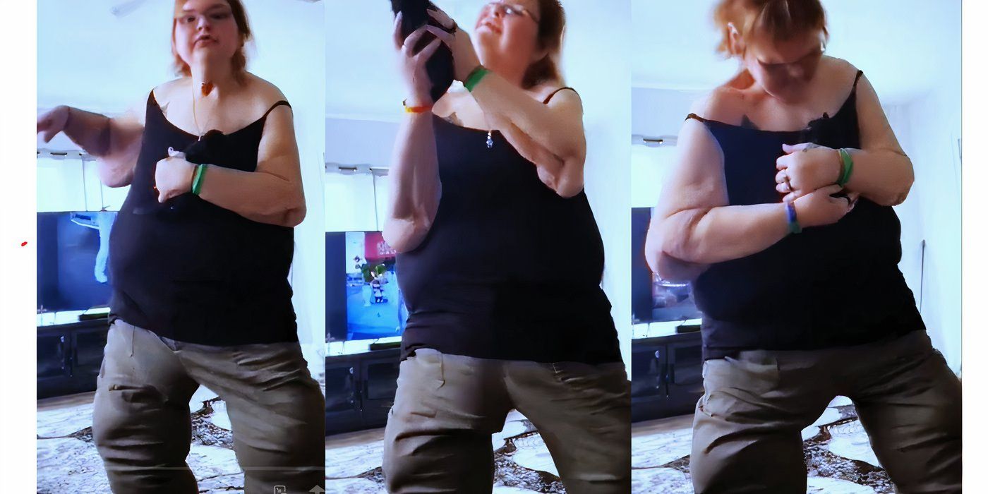 Tammy Slaton em 1000 Lb Sisters em top preto e calças cargo verdes dançando com gato