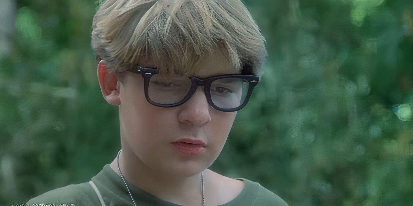 Teddy (Corey Feldman) looking down in Stand By Me