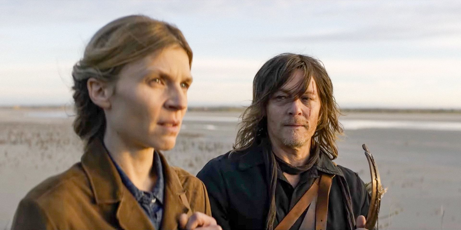 Daryl Dixon (Norman Reedus) staring intently at Isabelle Carrière (Clémence Poésy) in The Walking Dead: Daryl Dixon Season 2 Trailer