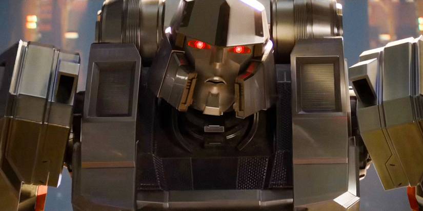 D-16 / Megatron (Brian Tyree Henry) with his eyes glowing red. in Transformers One