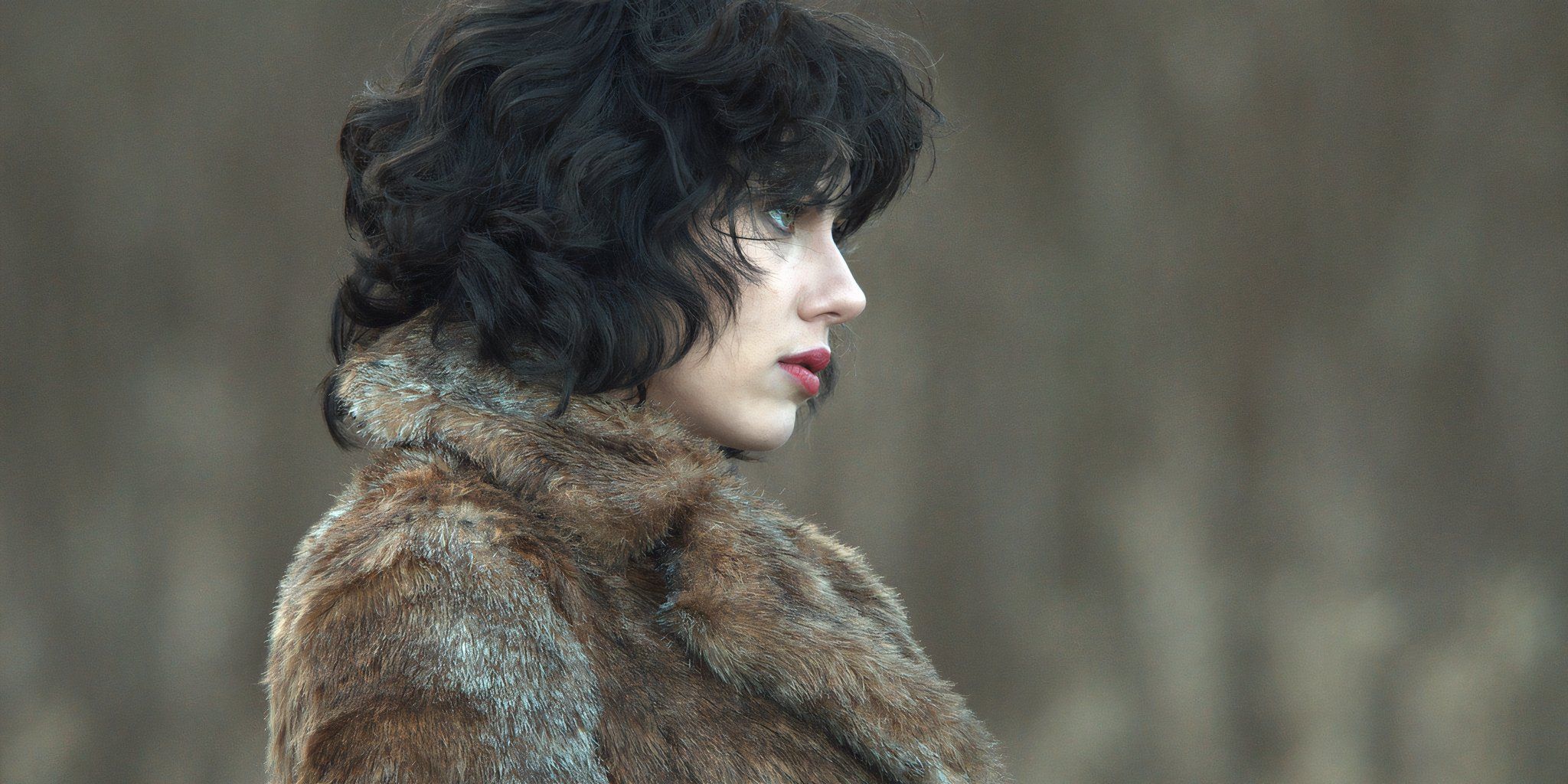 Scarlett Johansson wearing a fur coat in Under the Skin