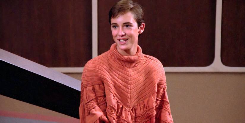 Wesley Crusher saves the day wearing orange sweater in Star Trek TNG