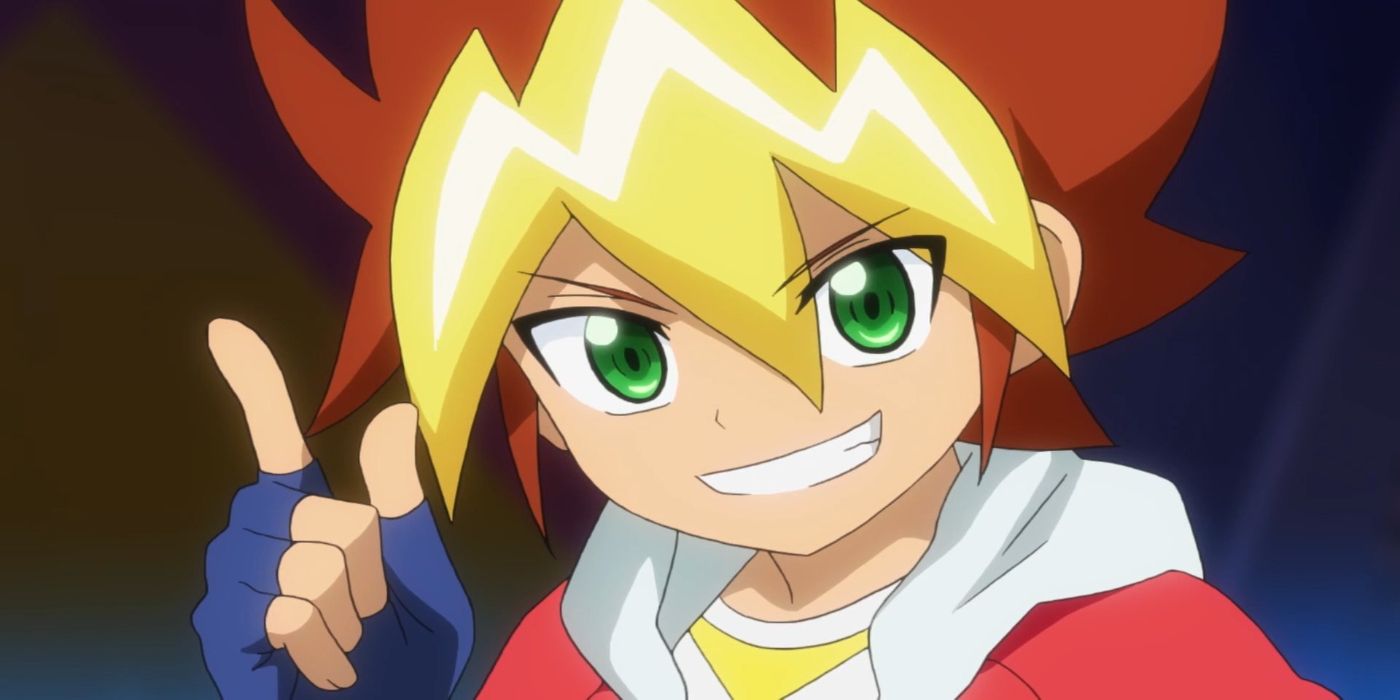 Yuga Ohdo de Yu-Gi-Oh! Sevens está sorrindo e apontando para cima. Ele está contra um fundo preto. Seu cabelo é amarelo e vermelho e seus olhos são verdes.