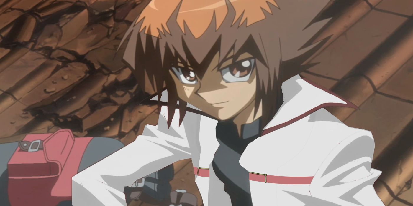 Yuki Judai, uma adolescente com cabelos castanhos espetados e grandes olhos castanhos, está sentada em um telhado marrom. 