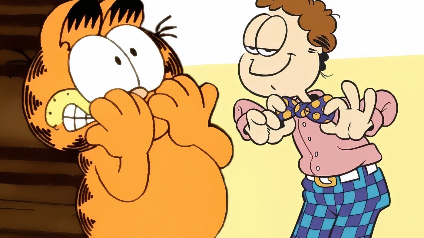 Garfield cringing at Jon wearing a bowtie. 