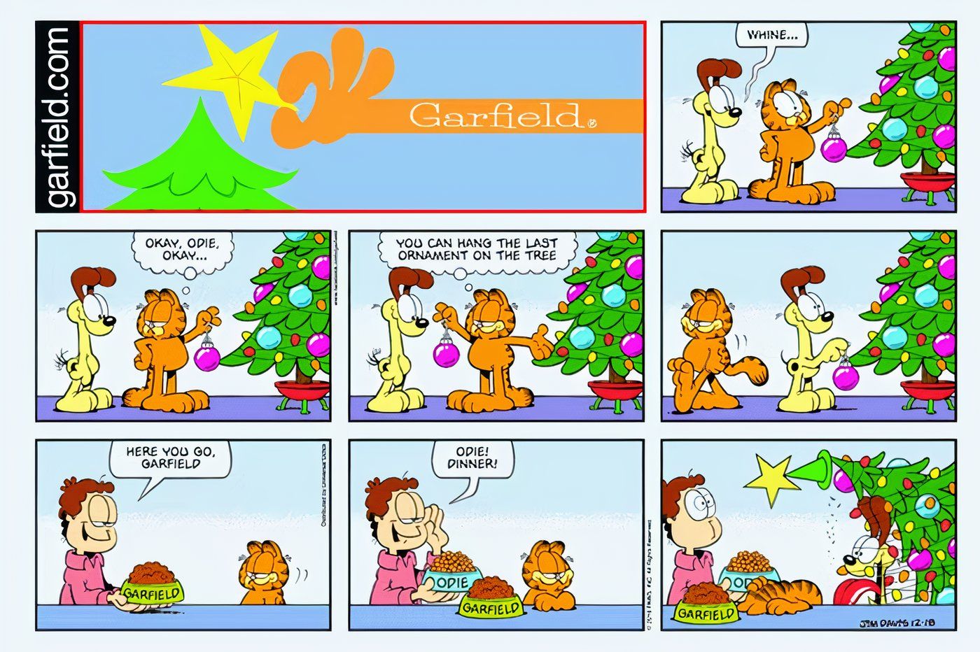 Odie destruindo a árvore de Natal de Garfield.