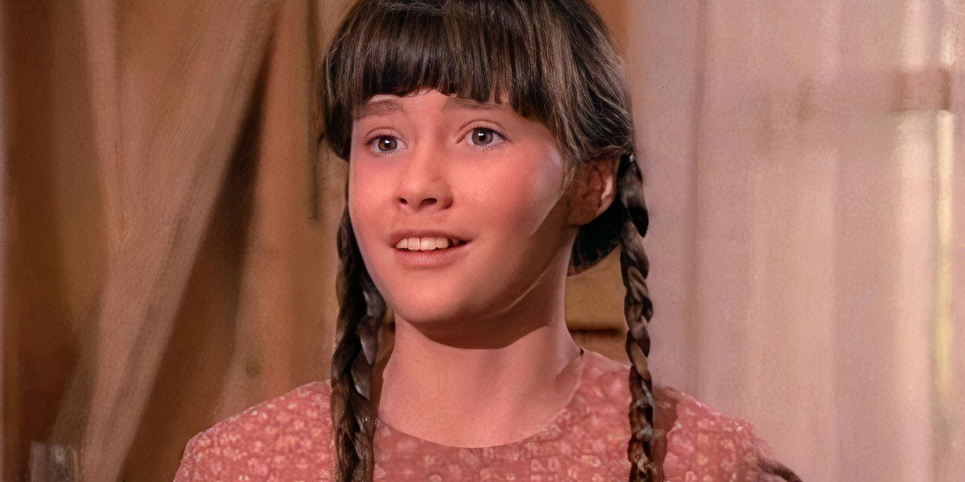 Una niña sonríe en Little House on the Prairie