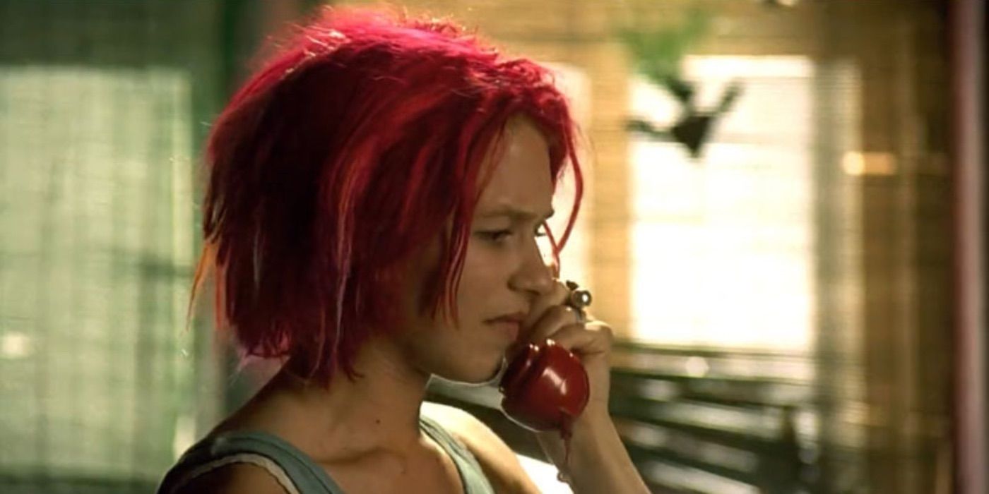 a woman with red hair on the phone in Run Lola Run
