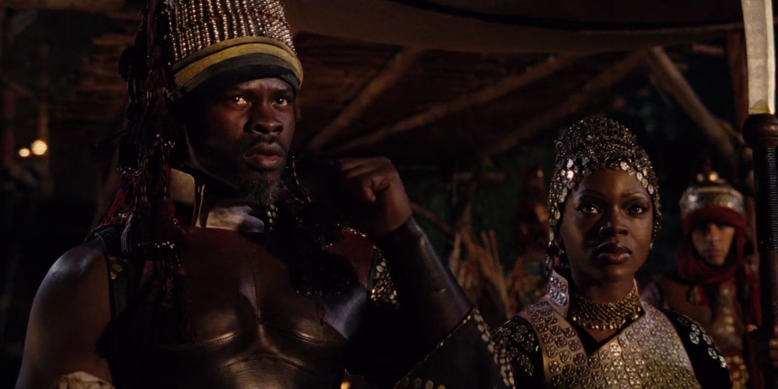 Ajihad (Djimon Hounsou) and Nasuada (Caroline Chikezie) look ahead at something in Eragon