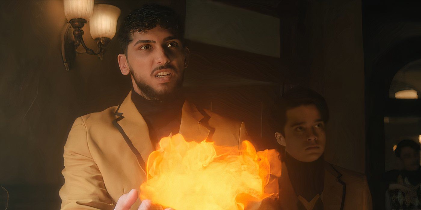 Armaan Jawandha como Phil Hargreeves conjurando fogo em The Umbrella Academy.