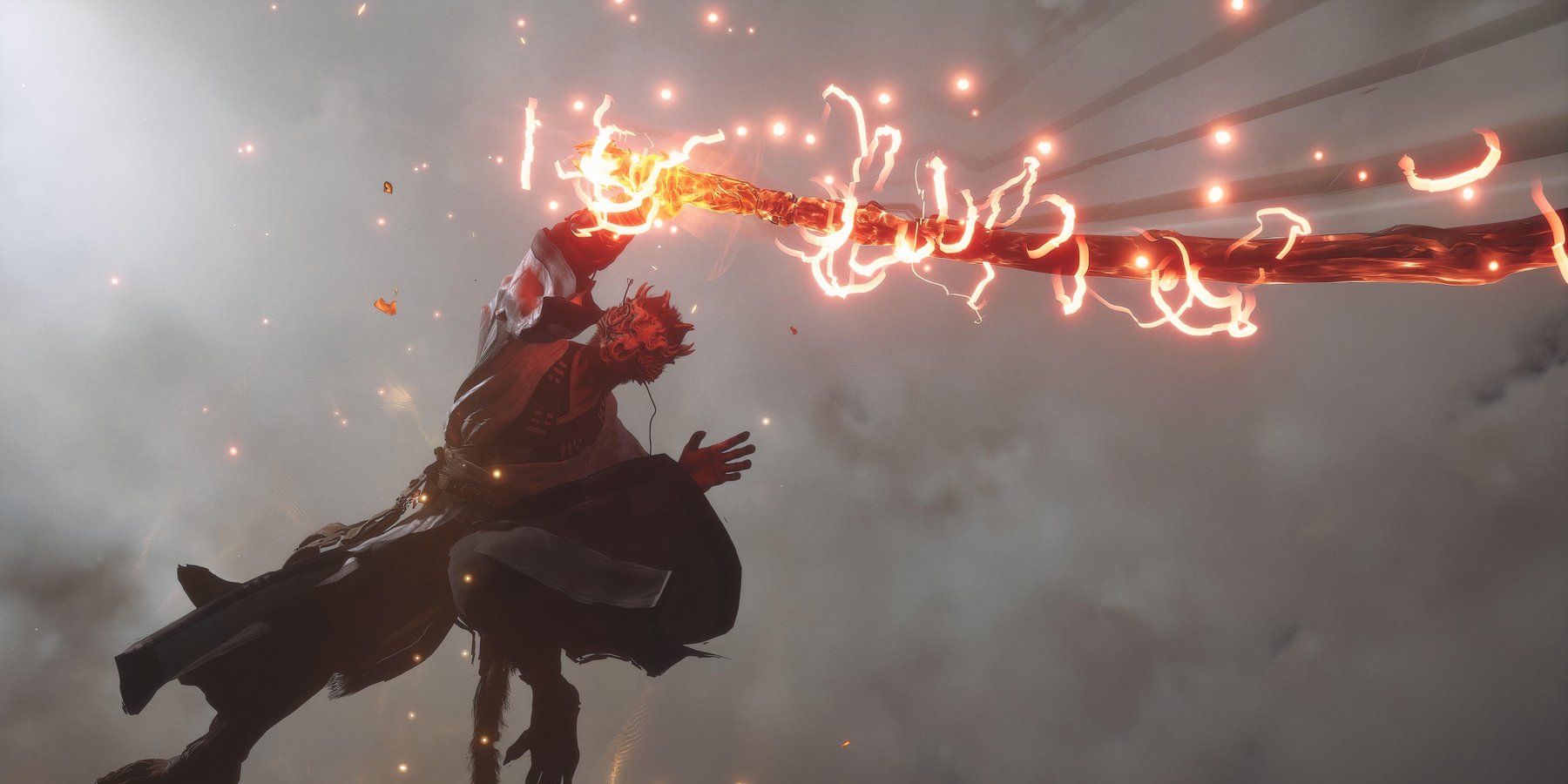 Wukong Wielding A Flaming Staff While In The Air In Black Myth Wukong