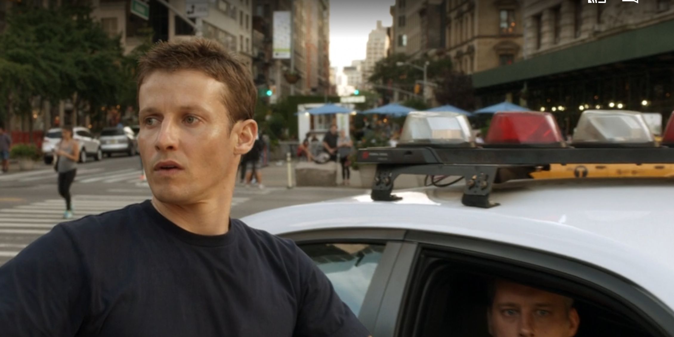 Blue Bloods Jamie asks a cop for a favor at his squad car