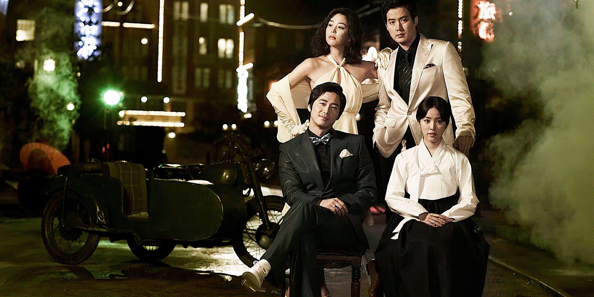 capital scandal cast with period clothing and old motorcycle with sidecar in background