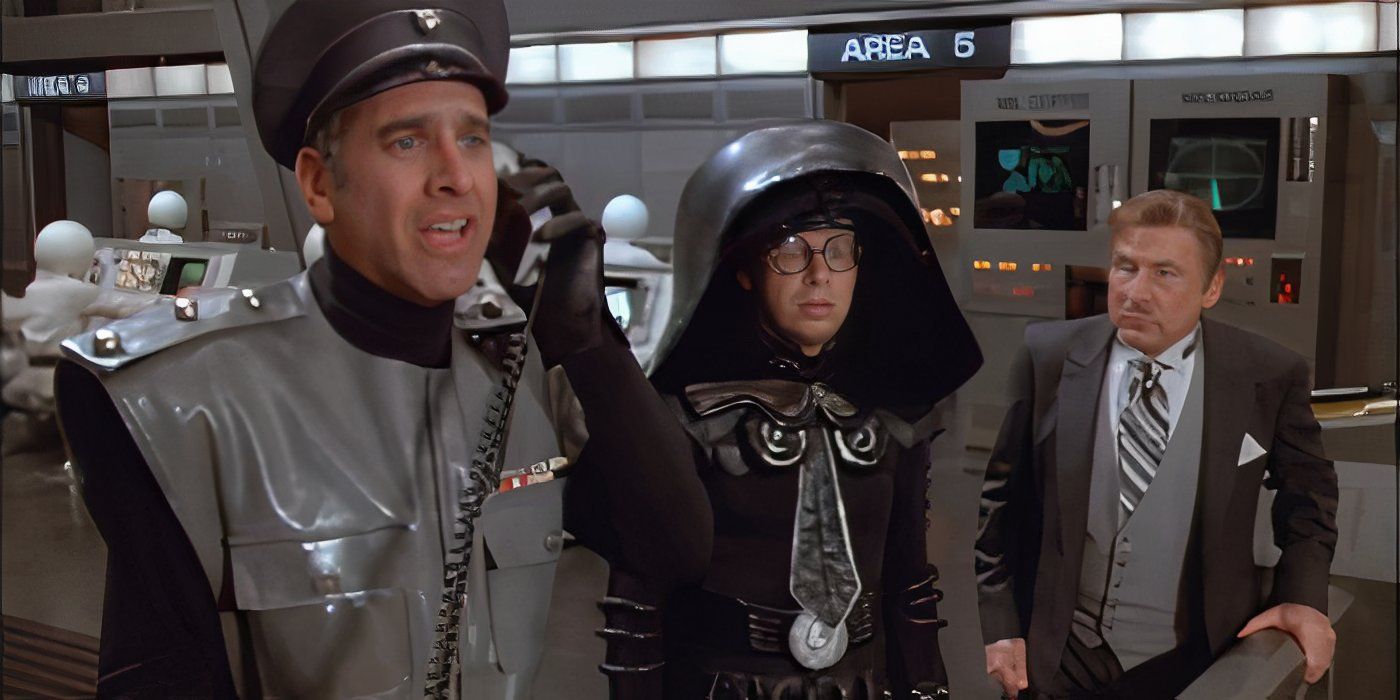 Coloney Sandurz standing with Darth Helmet and Presiddent Skroob in Spaceballs