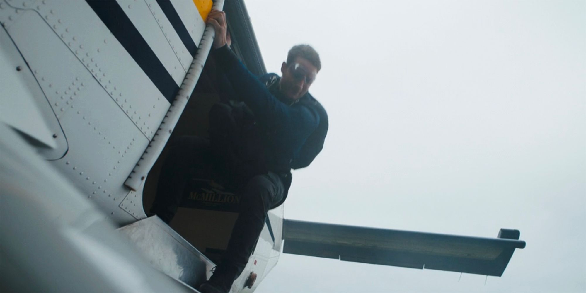 Colter Shaw preparing to jump out of a plane in Tracker