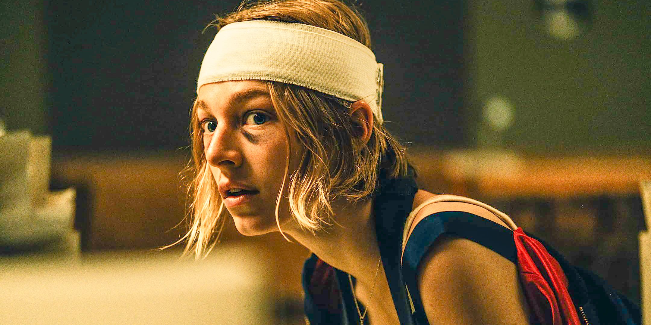 Gretchen (Hunter Schafer) with a bandage on her head and a frightened expression on her face in Cuckoo (2024)