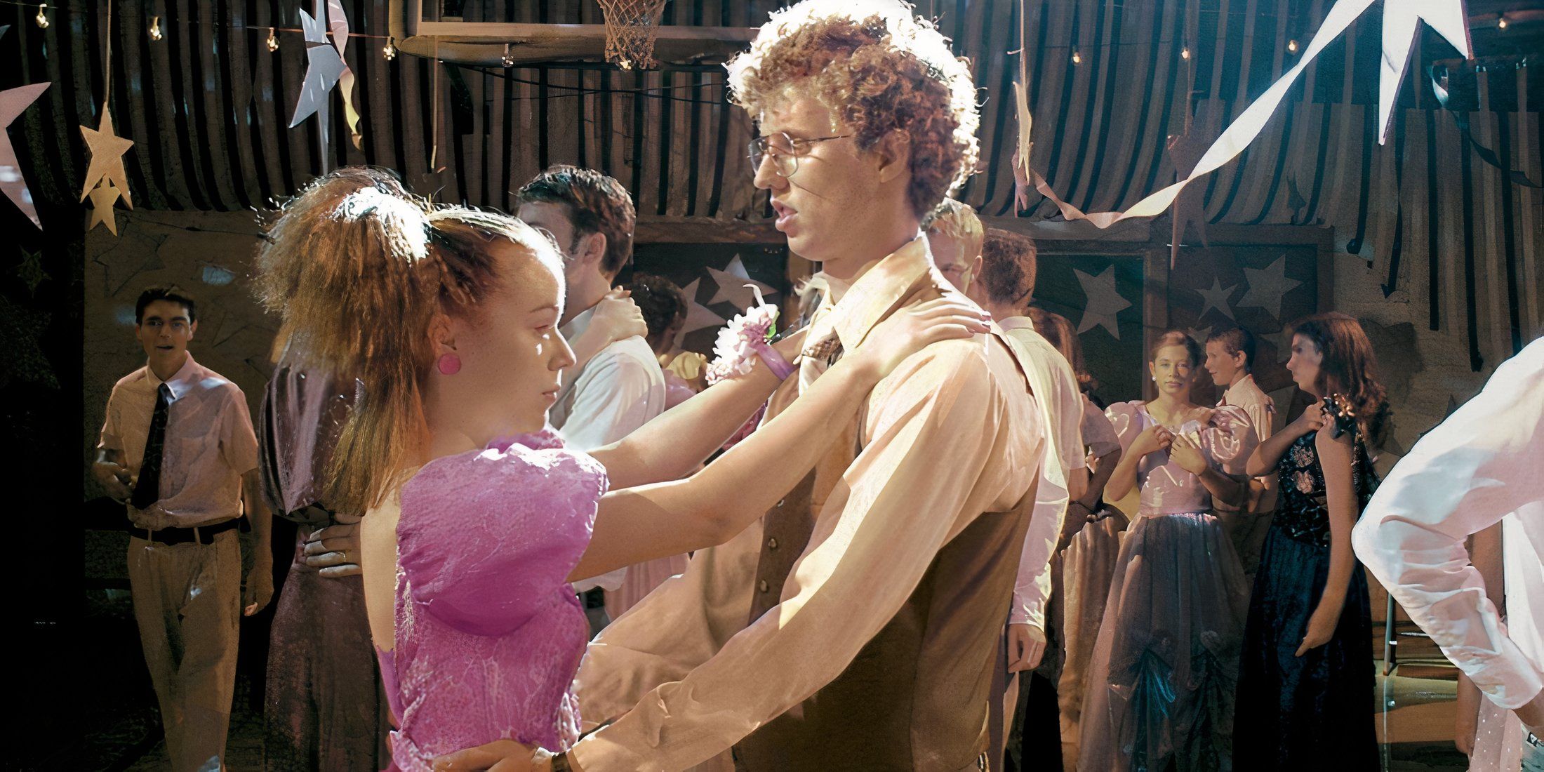 Deb and Napoleon dancing together in the gym in Napoleon Dynamite