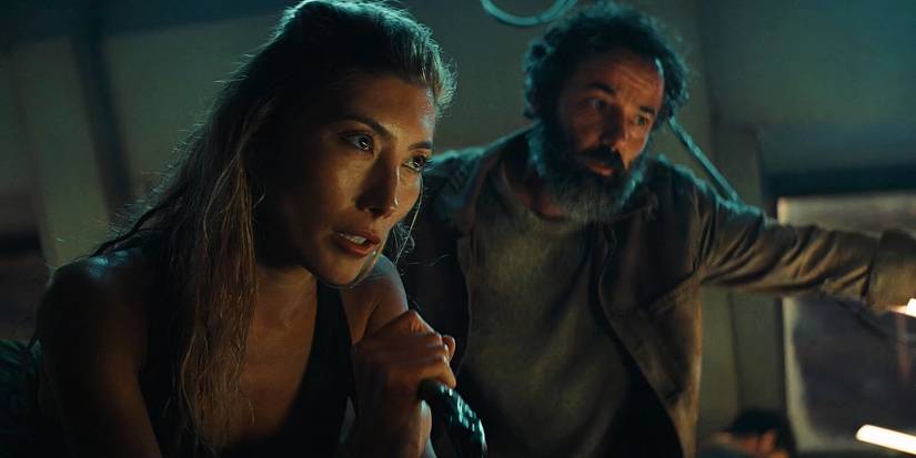 Dichen Lachan talking on mic in Kingdom of the Planet of the Apes ending