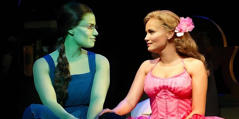 Elphaba (Idina Menzel) and Glinda (Kristin Chenoweth) sit together during Popular from Wicked