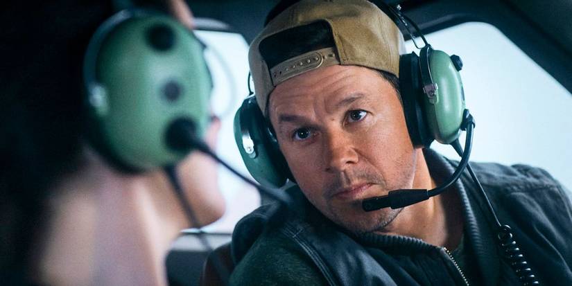 Mark Wahlberg with a headset on in Flight Risk