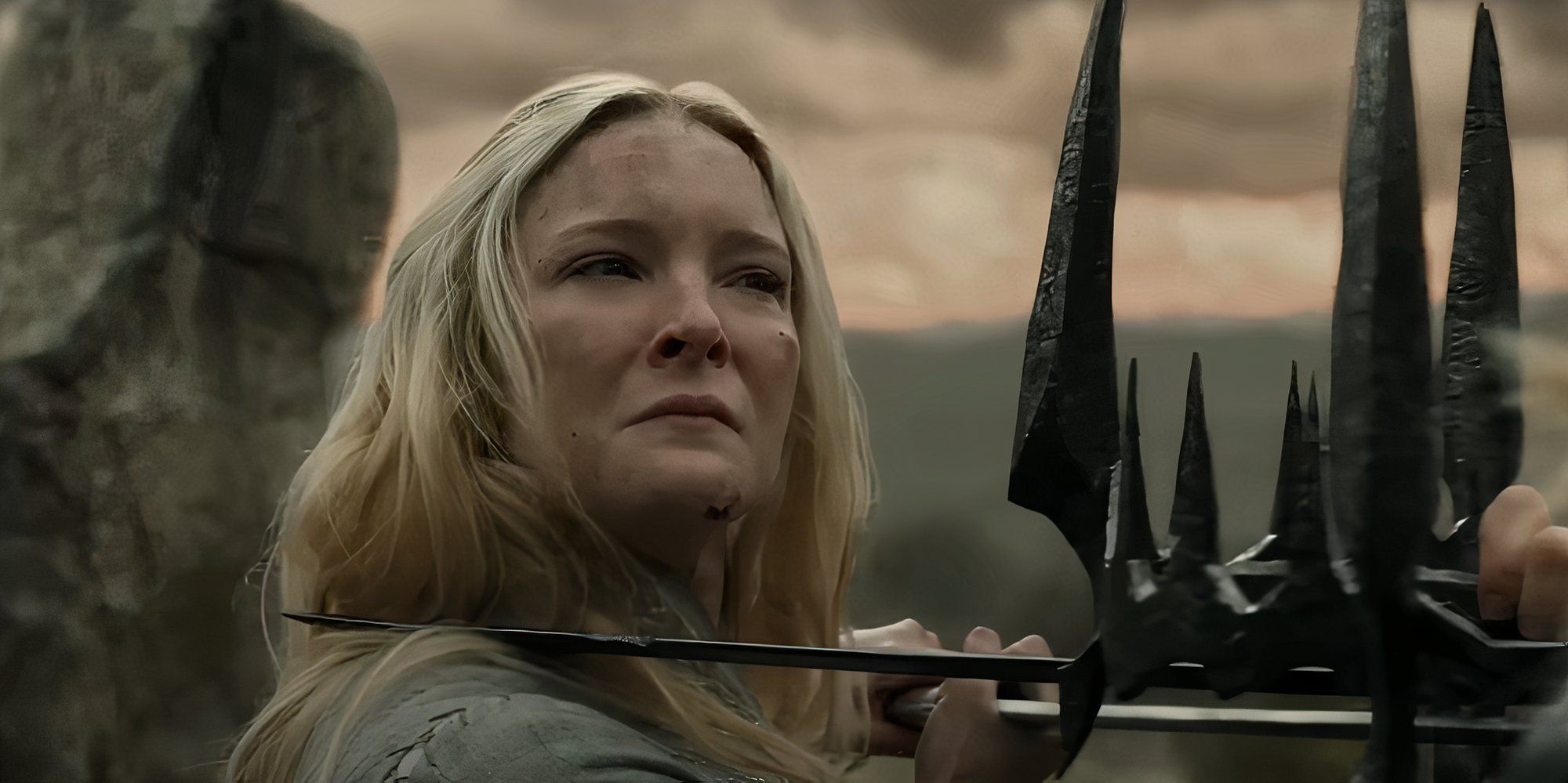 Galadriel crying while fighting Sauron