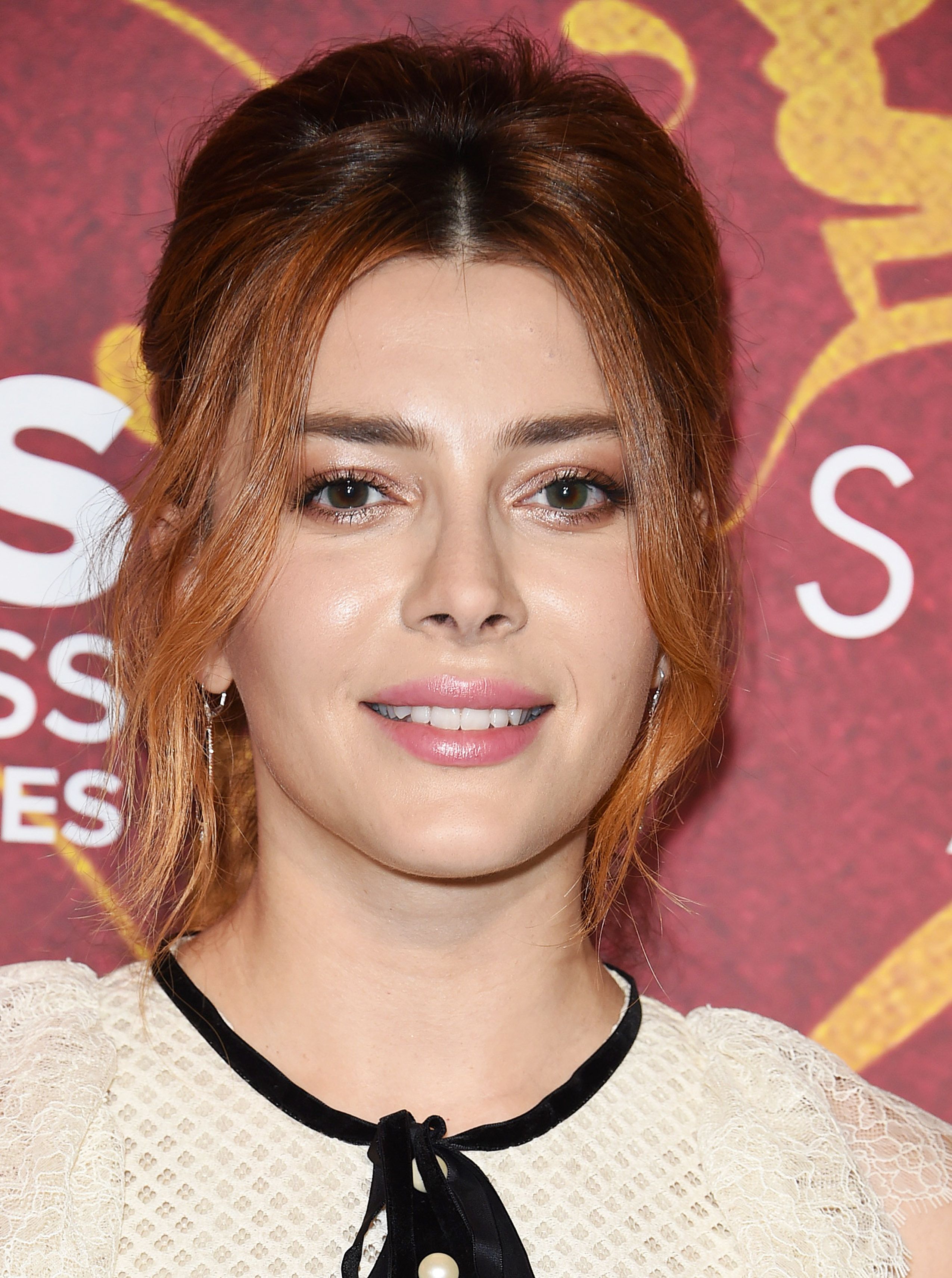 Headshot Of Elena Satine