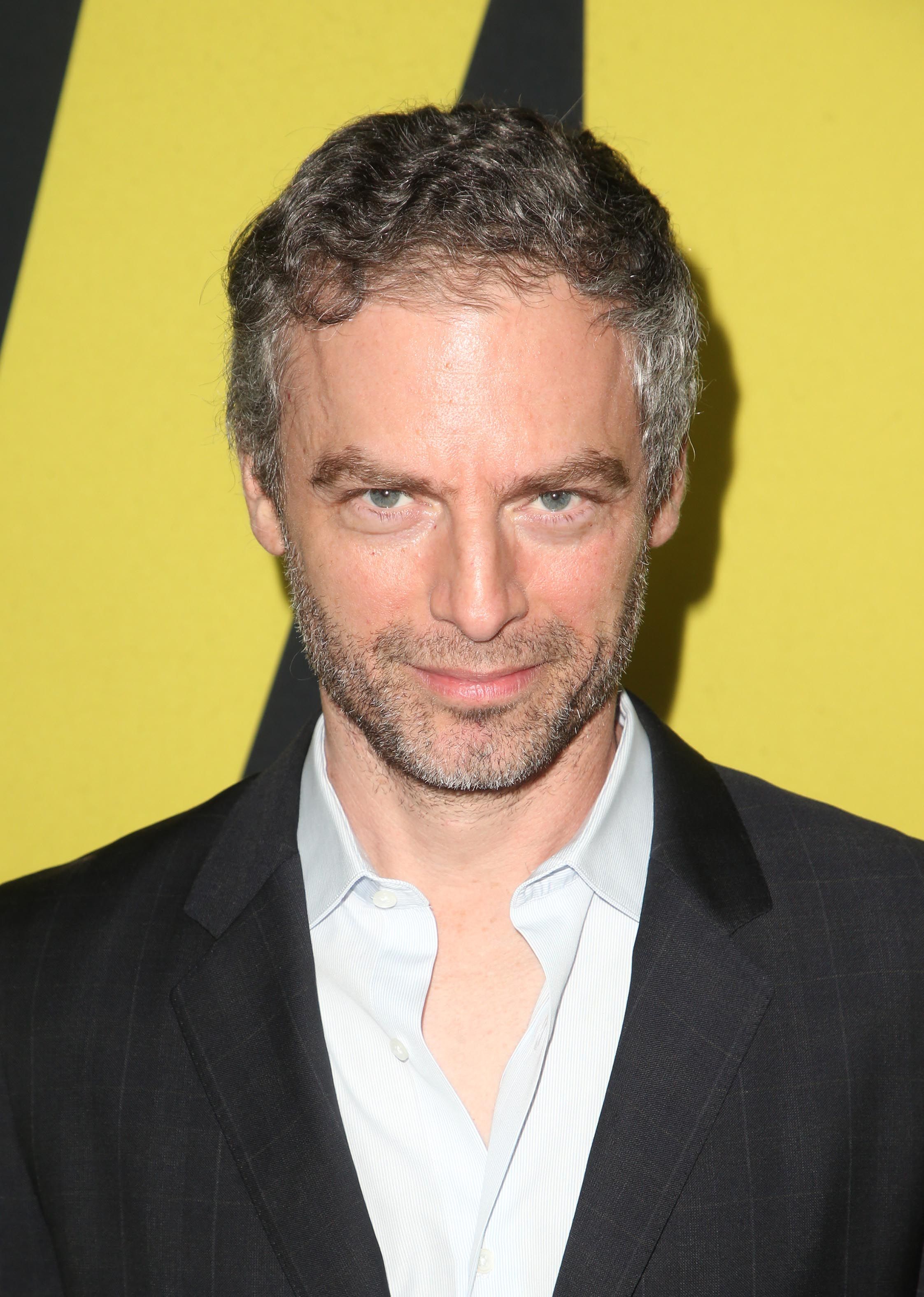 Headshot Of Justin Kirk