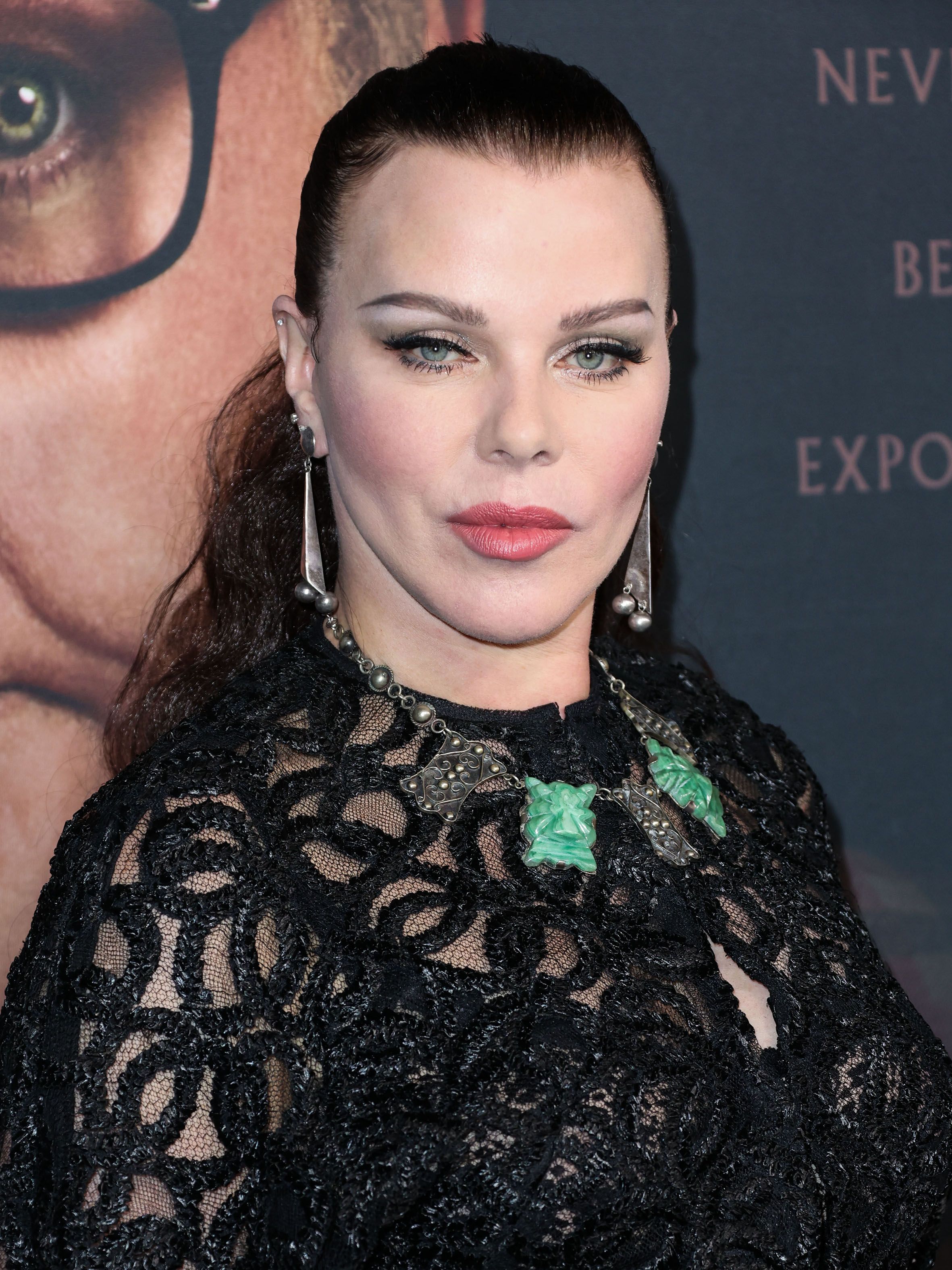 Shot in the head of Debi Mazar