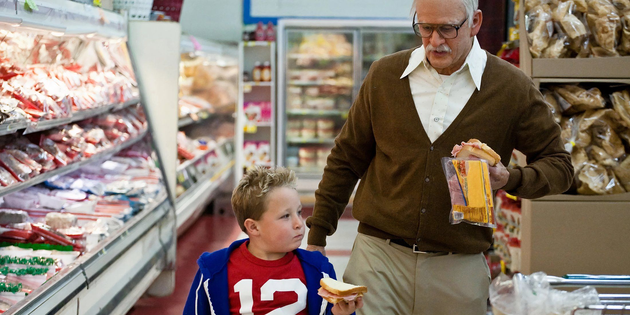 Irving and Billy eating sandwiches in Bad Grandpa
