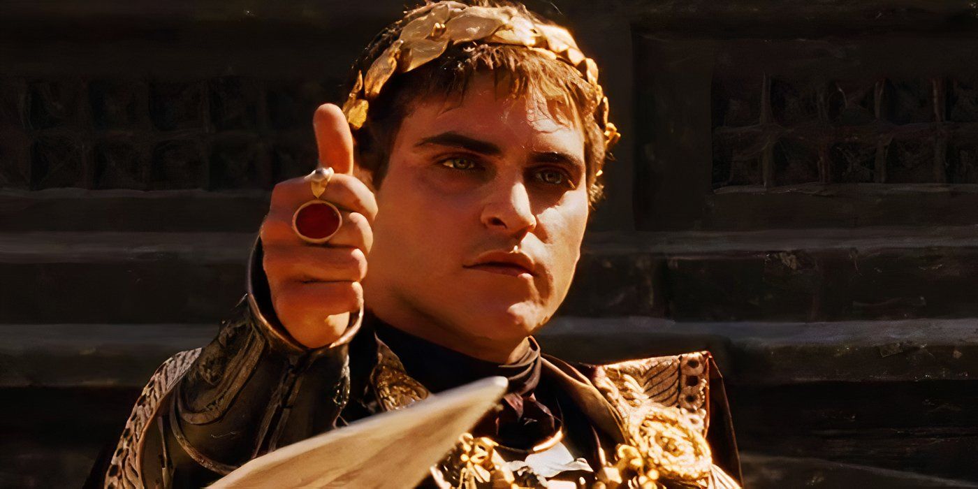 Joaquin Phoenix as Commodus sticking his hand out in Gladiator