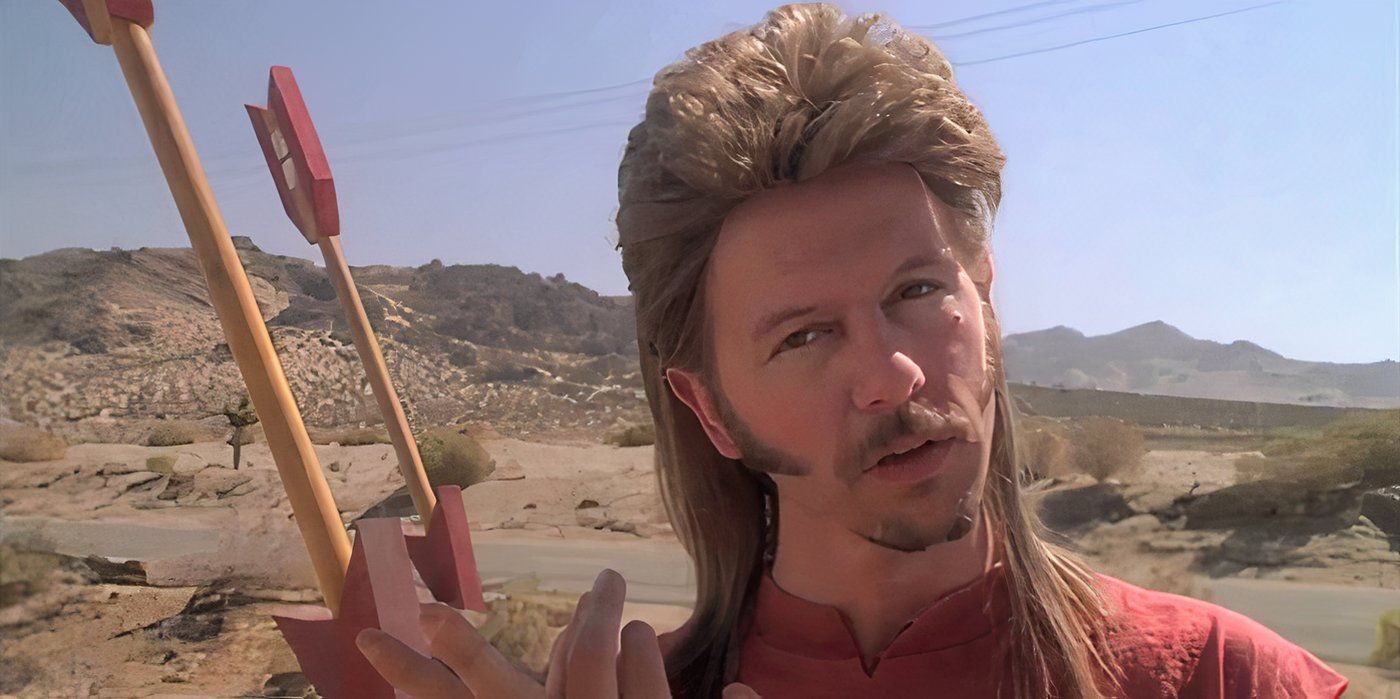 Joe Dirt (David Spade) em uma barraca de fogos de artifício parecendo impressionado com Joe Dirt