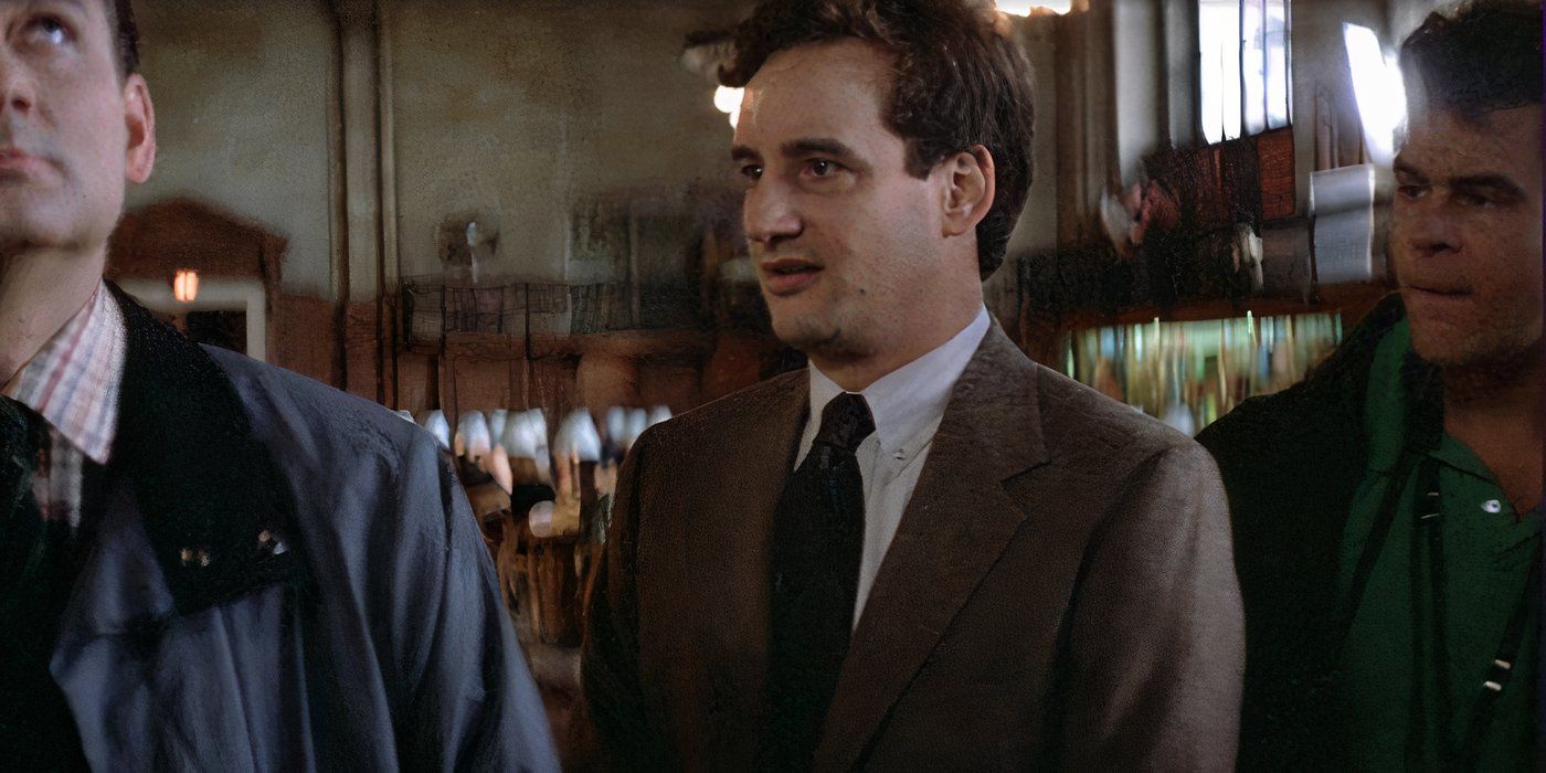 John Rothman wearing a tie and looking confused in Ghostbusters