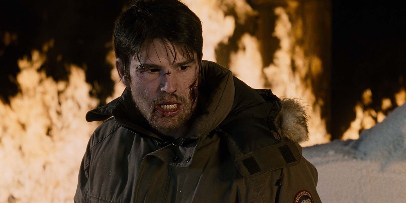 josh harnett in a scene with fire and snow in 30 Days Of Night.