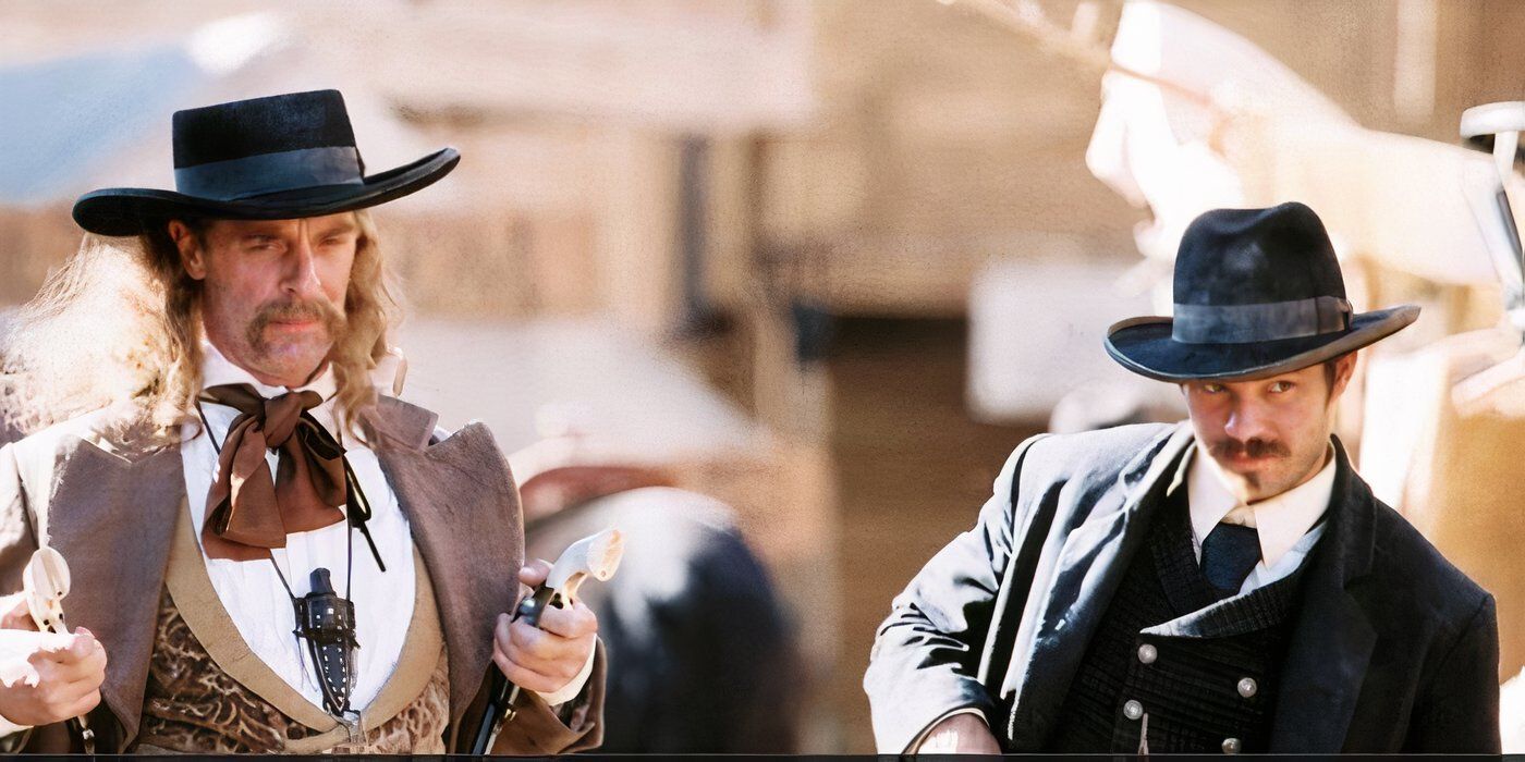 Keith Carradine and Timothy Olyphant as Wild Bill and Seth holding guns in Deadwood