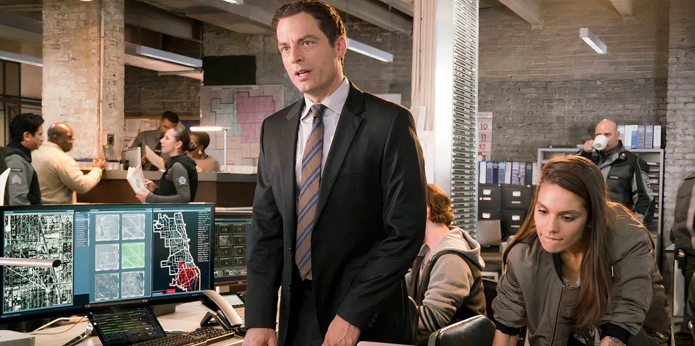 APB (2014) Gideon Reeves standing at desk