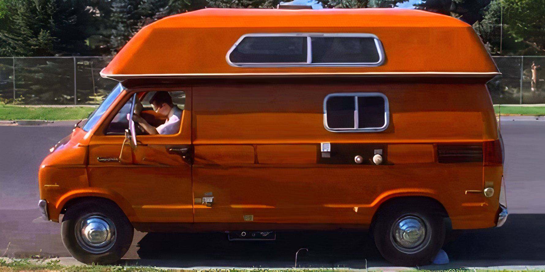 Kip driving an orange van in Napoleon Dynamite