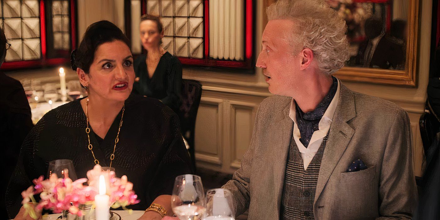 Marianne looks angry and Luc looks stunned when her secret is revealed at dinner in Emily in Paris season 4, part 1