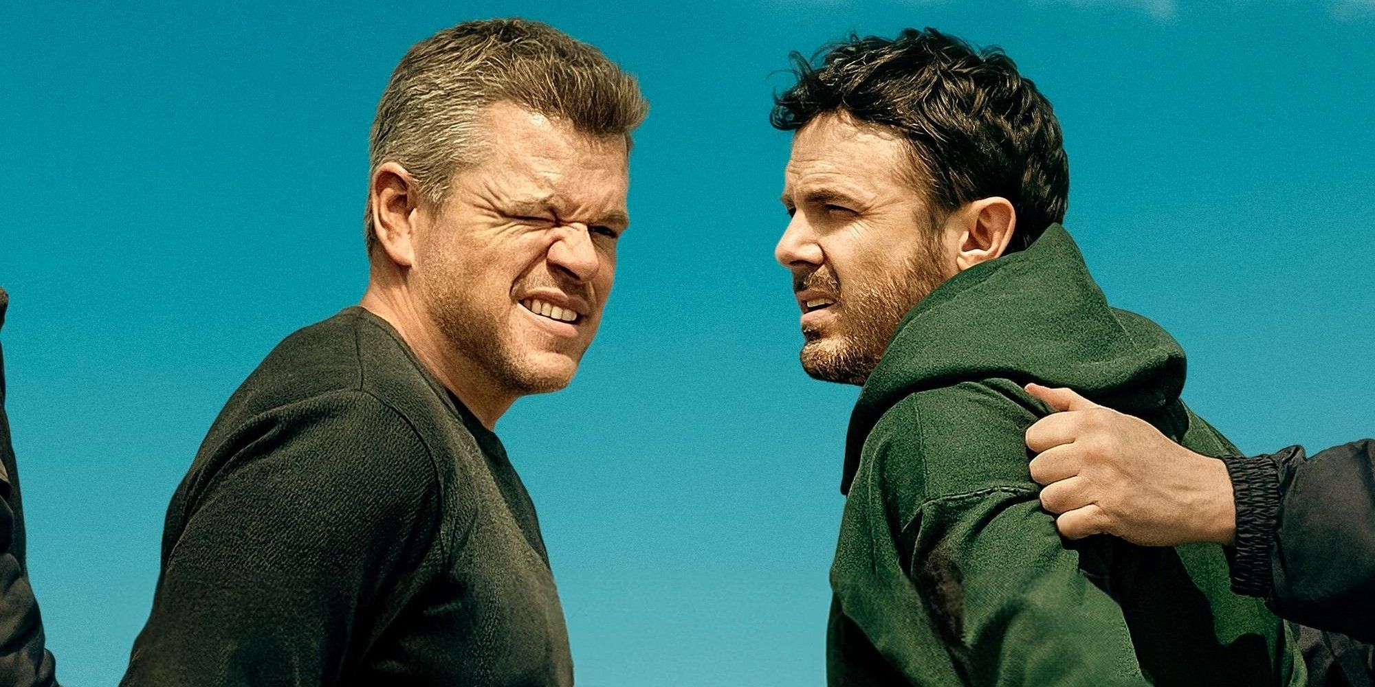 Matt Damon Squinting And Facing Casey Affleck As They're Handcuffed In The Instigators Poster