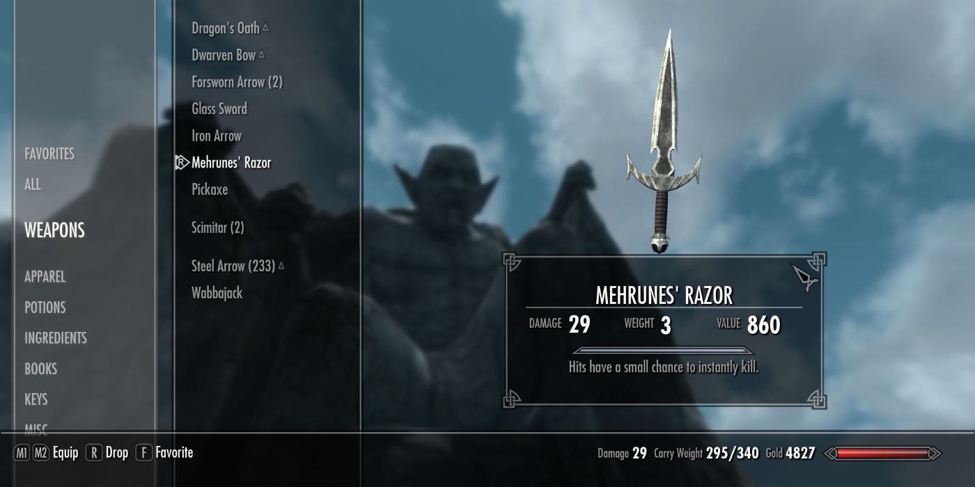 Players looking at Mehrunes' Razor weapon and stats in their inventory in Skyrim