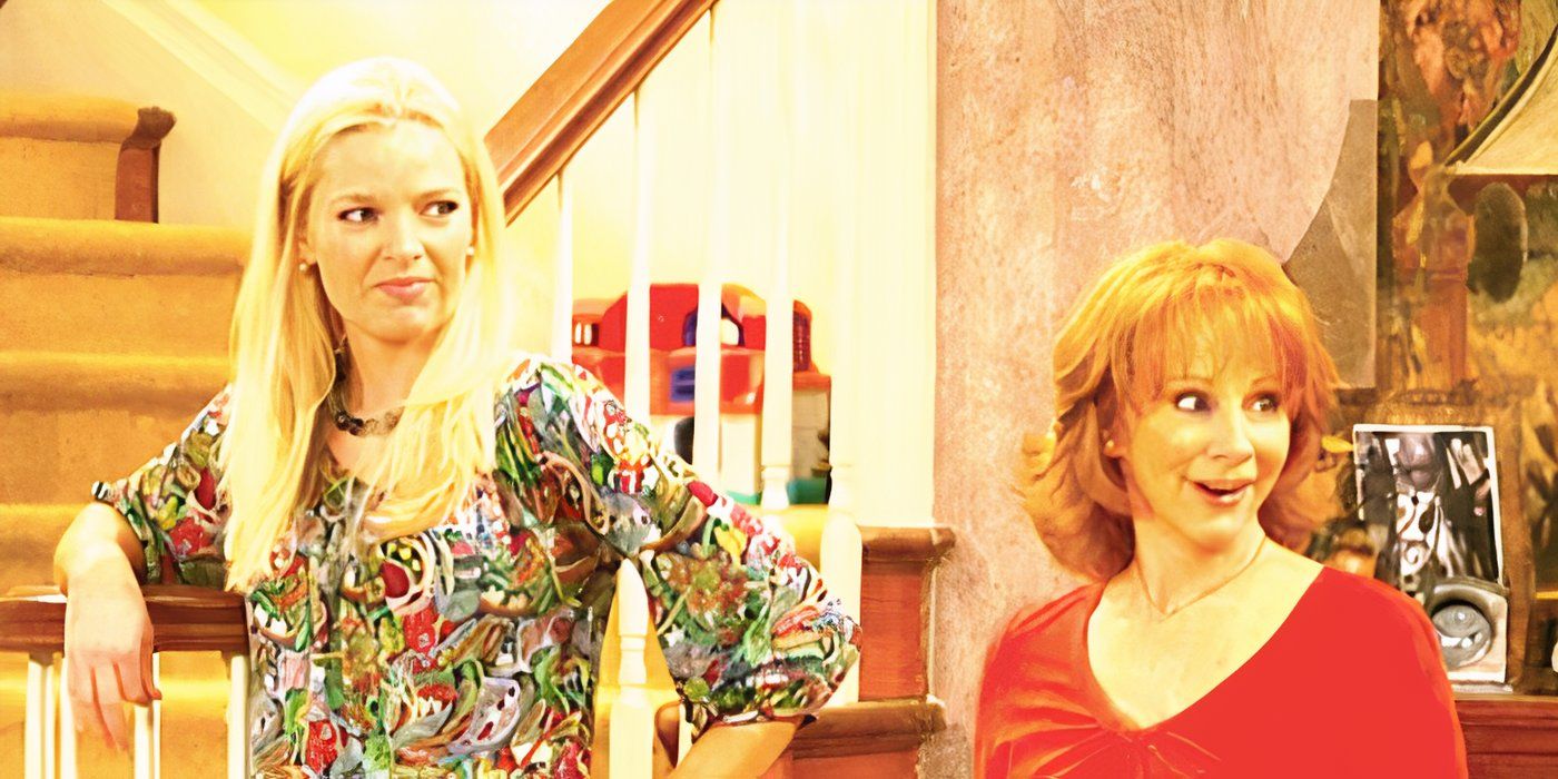 Melissa Peterman's Barbra and Reba McEntire's Reba stand at a stairs in Reba