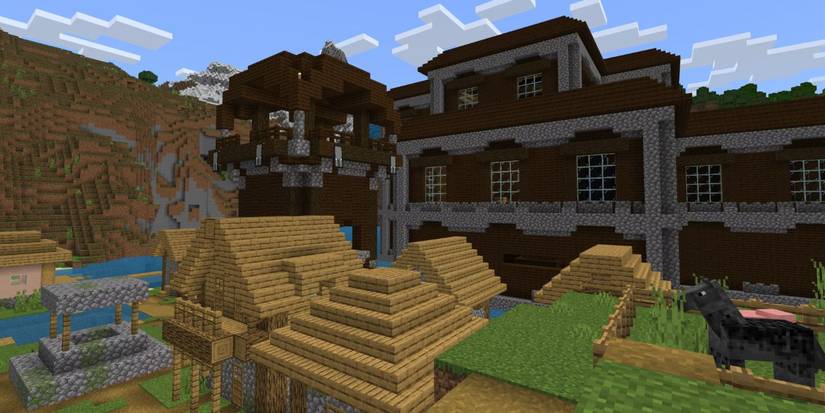 Minecraft Village With Pillager Outpost And Woodland Mansion.