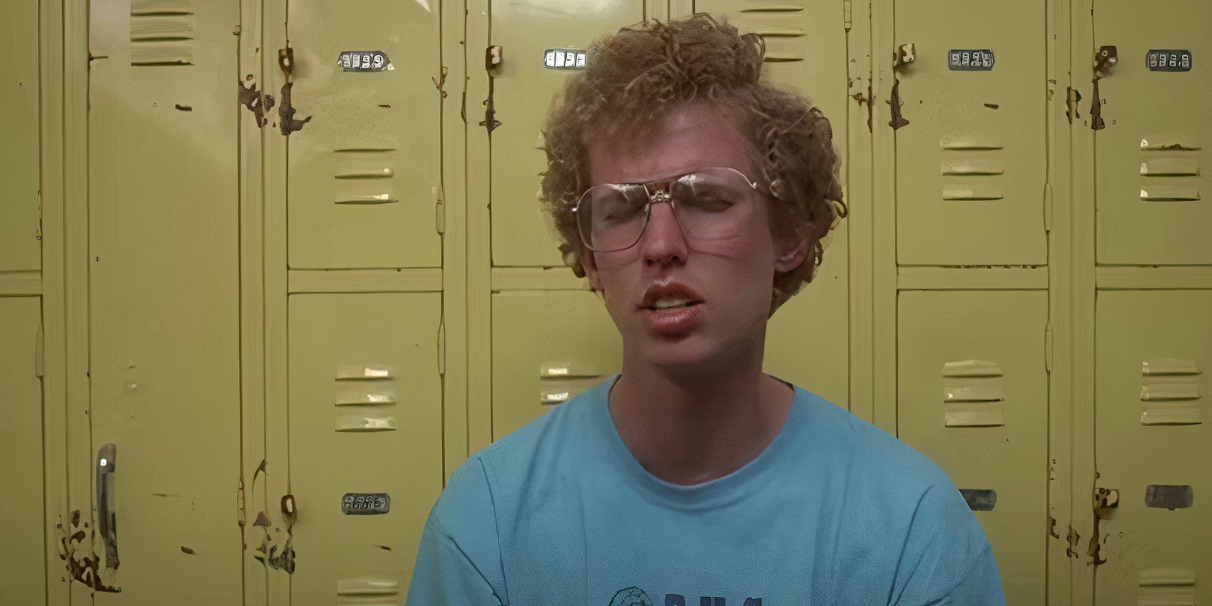 Napoleon with his eyes closed in front of a bank of yellow lockers in Napoleon Dynamite