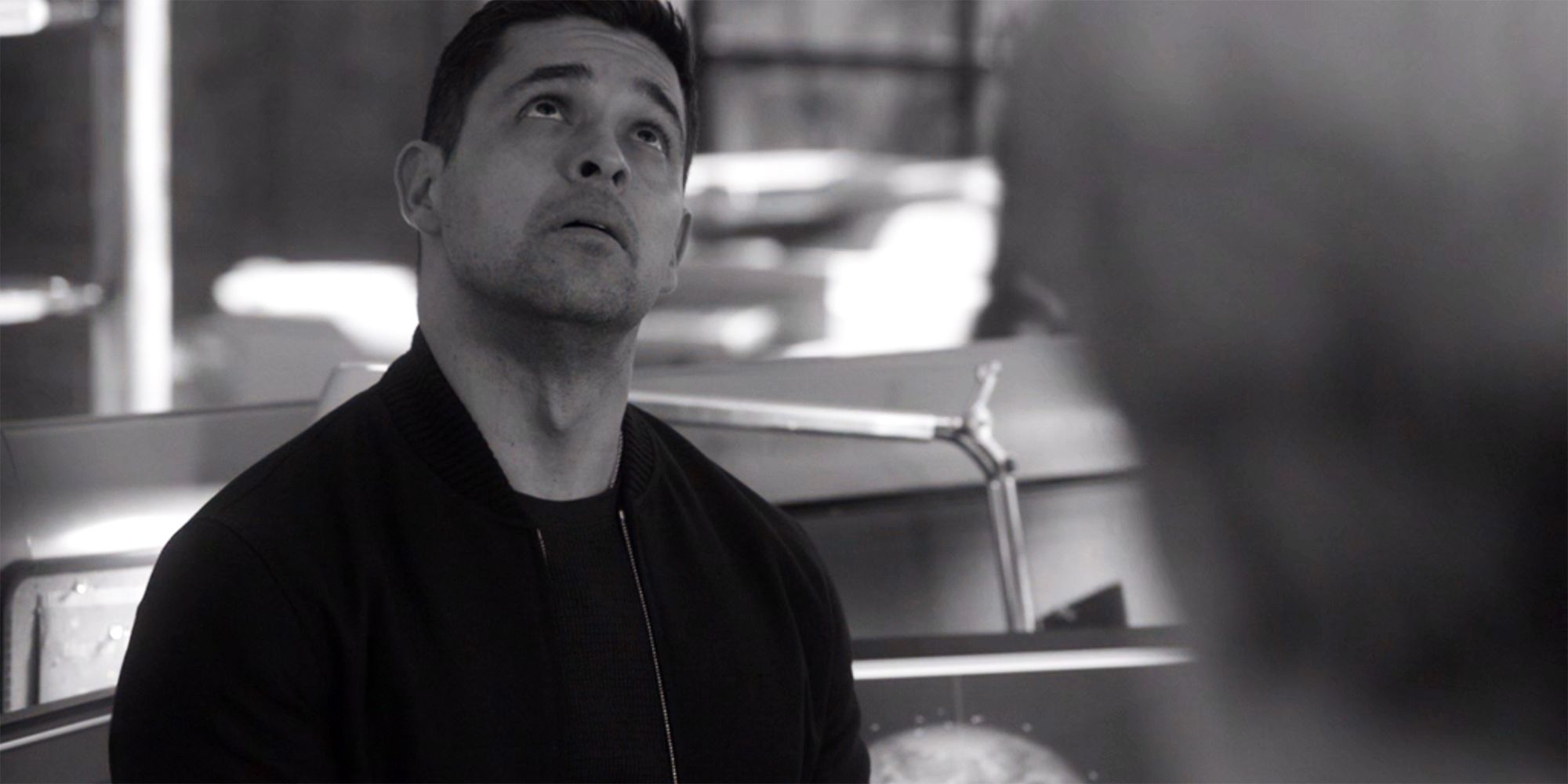 Nick Torres in a paused black and white image in NCIS season 21