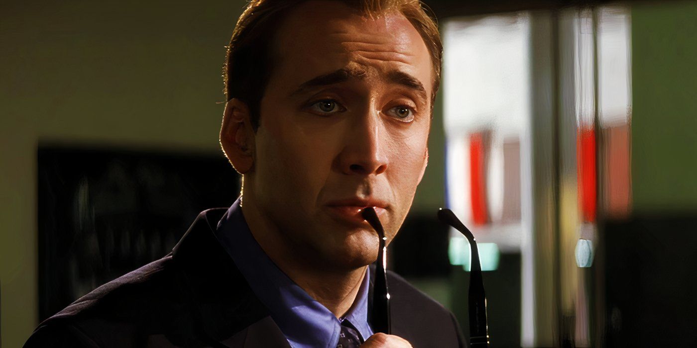 Nicolas Cage as Memphis Raines in Gone in 60 Seconds taking his sunglasses off